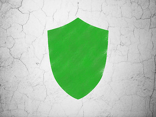 Image showing Protection concept: Shield on wall background