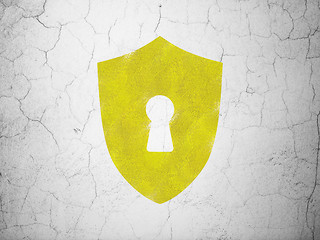 Image showing Protection concept: Shield With Keyhole on wall background