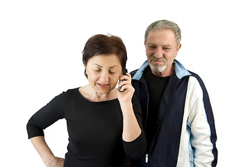 Image showing Wife on the Phone while Husband Waiting for the News