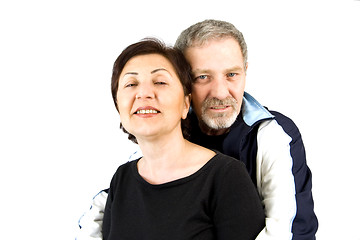 Image showing Couple Hugging while Looking At the Camera