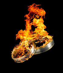 Image showing burning wedding rings