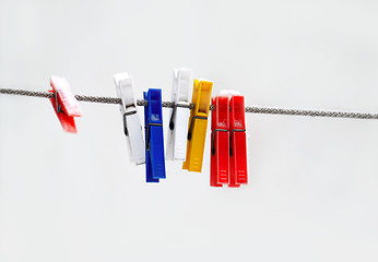 Image showing Colorful plastic clothespins