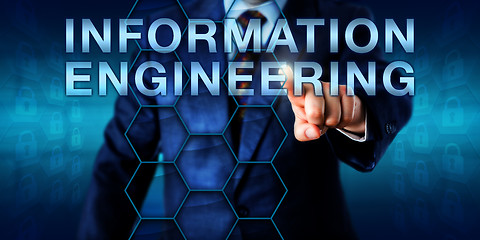 Image showing Engineer Pressing INFORMATION ENGINEERING