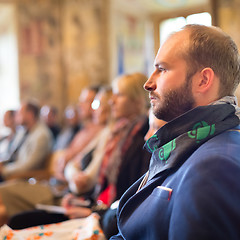 Image showing Entrepreneur in audience at business conference.