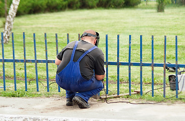 Image showing working welder