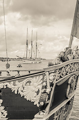 Image showing Old sailboat in the harbor, sepia