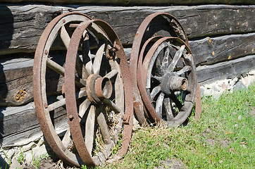 Image showing Old wheel from carts in the countryside  