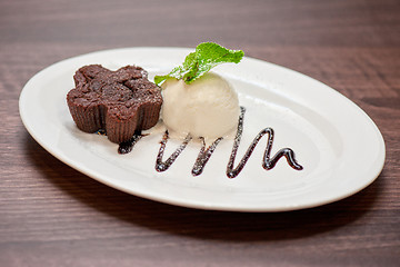 Image showing chocolate cake with ice cream