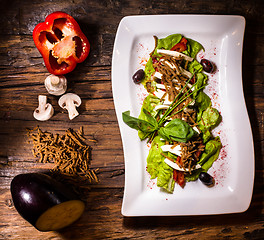 Image showing aubergine,mozzarella and tomato with basil