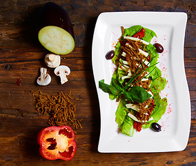 Image showing aubergine,mozzarella and tomato with basil