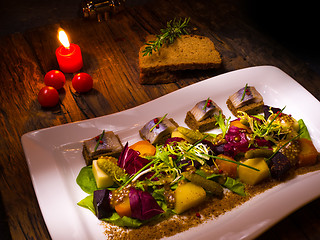 Image showing Canape from rye bread with herring slice 