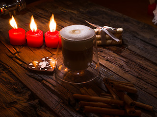 Image showing Frothy, layered cappuccino in a clear glass mug