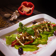 Image showing Salad from aubergine,mozzarella and tomato with basil. 