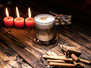 Image showing Frothy, layered cappuccino in a clear glass mug