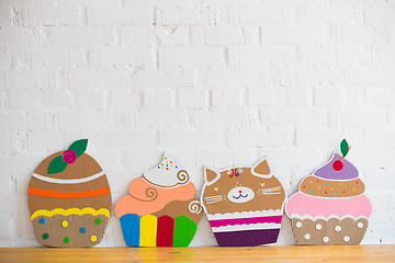 Image showing colored cakes handmade of cardboar 