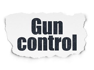 Image showing Safety concept: Gun Control on Torn Paper background