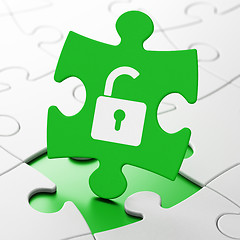 Image showing Safety concept: Opened Padlock on puzzle background