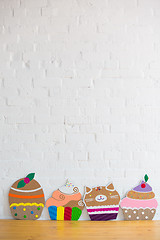 Image showing colored cakes handmade of cardboar 