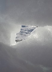 Image showing Glimt of light through the snow
