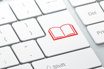 Image showing Studying concept: Book on computer keyboard background