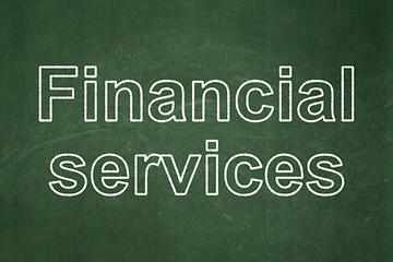 Image showing Money concept: Financial Services on chalkboard background