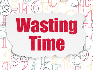 Image showing Time concept: Wasting Time on Torn Paper background