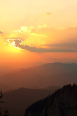 Image showing orange sunset over the hills