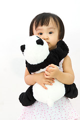 Image showing Chinese Little Girl Holding Panda Toy