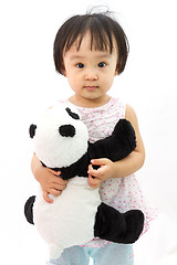 Image showing Chinese Little Girl Holding Panda Toy