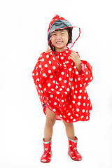 Image showing Chinese Little Girl Wearing raincoat and Boots