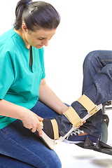 Image showing Orthopedic equipment for young man in wheelchair