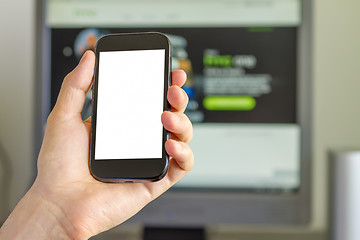 Image showing Closeup of Man's Hand holding a Smartphone