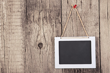 Image showing Empty wooden blackboard sign