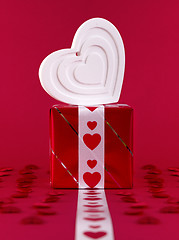 Image showing white shape heart over gift box