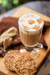 Image showing coffee latte cup with cookies