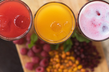 Image showing fruit drink with cranberries raspberries and sea buckthorn