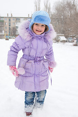 Image showing Happy girl enjoys snow