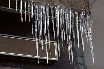 Image showing Roof of house with icicles