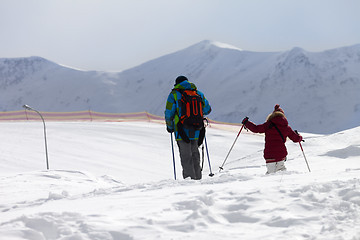 Image showing Father and daughter on ski resort after snowfall