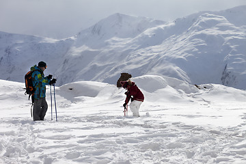 Image showing Father and daughter on ski resort after snowfall.