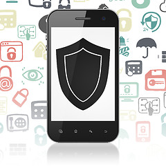 Image showing Security concept: Smartphone with Shield on display