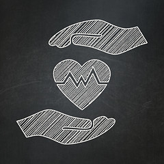 Image showing Insurance concept: Heart And Palm on chalkboard background