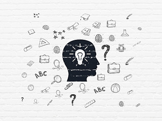 Image showing Studying concept: Head With Light Bulb on wall background