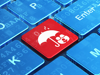 Image showing Privacy concept: Family And Umbrella on computer keyboard background