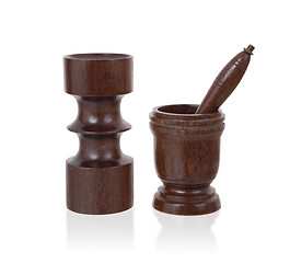 Image showing Handmade wooden mortar and candle holder isolated