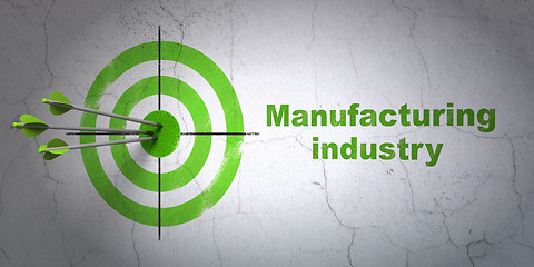 Image showing Manufacuring concept: target and Manufacturing Industry on wall background