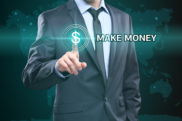 Image showing business, technology, internet concept - businessman pressing make money button on virtual screens