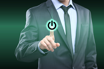 Image showing Businessman pressing power button concept