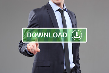 Image showing Businessman touching a download button on virtual screen. internet concept