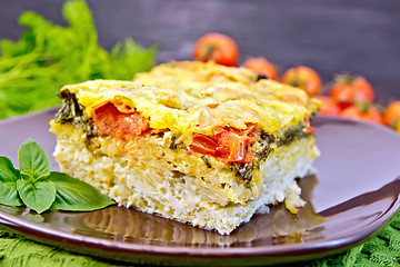 Image showing Pie potato with tomato on board